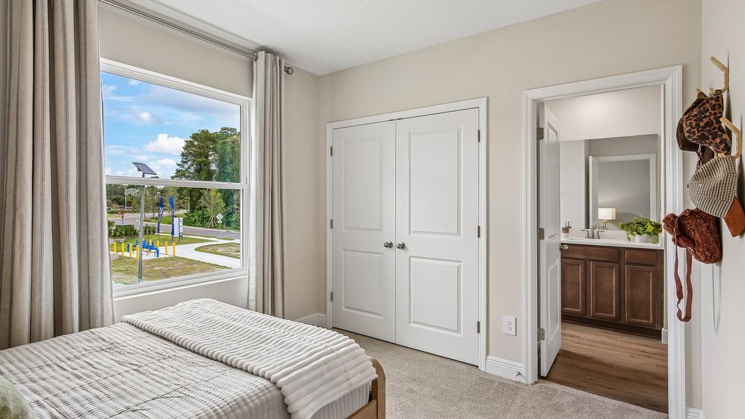 Furnished interior in a model home at Sanctuary at Citrus Park Townhomes in Tampa (Image 28).