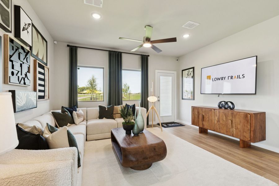 Living Room in a Lowry Trails New Magnolia Model in Princeton TX by Trophy Signature Homes