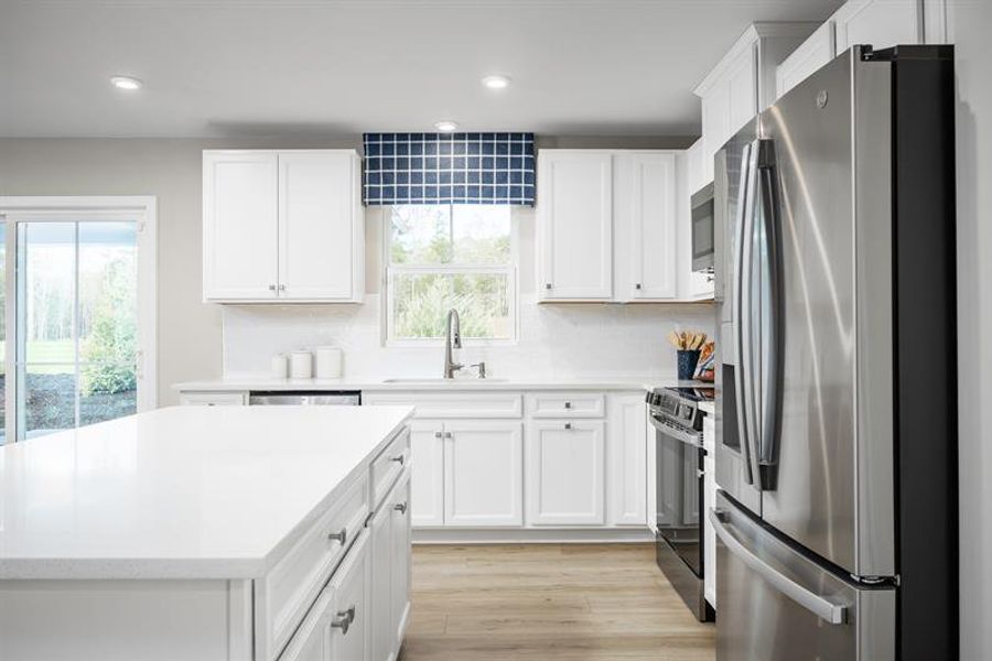 Chef's kitchen with all appliances included, island, & backsplash now included through 6/14
