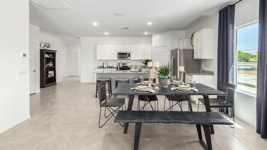Furnished interior in a model home at Casas del Cerrito in Tucson (Image 16).