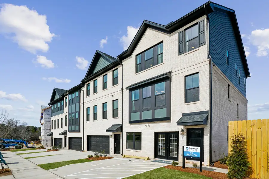 Front exterior of a home in the Midtown Rows community, located in Fuquay Varina, NC (Image 3).