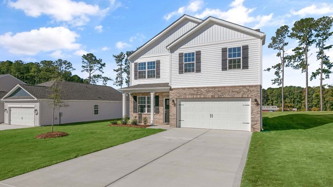 Front exterior of a home in the Southbury community, located in Carthage, NC (Image 13).