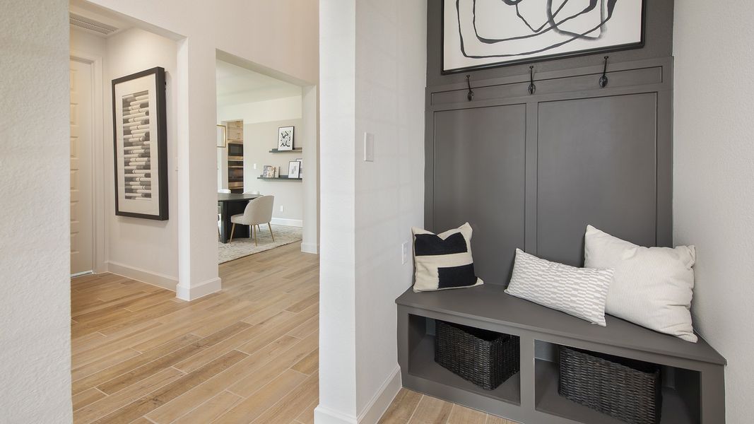 Furnished interior in a model home at Cross Creek West 55' in Fulshear (Image 24).