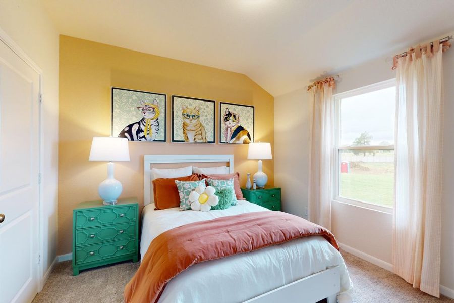 A bedroom with a bed and lamps. A bedroom with a bed and lamps.