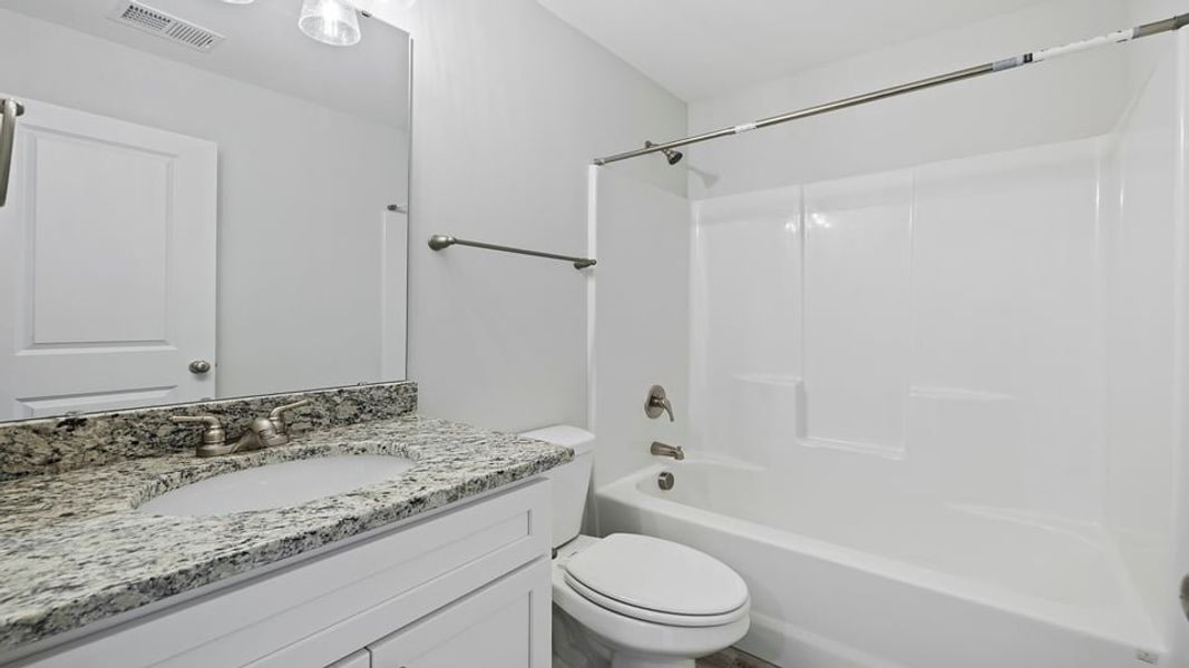 Furnished interior in a model home at Hampshire Heights in Moore (Image 14).