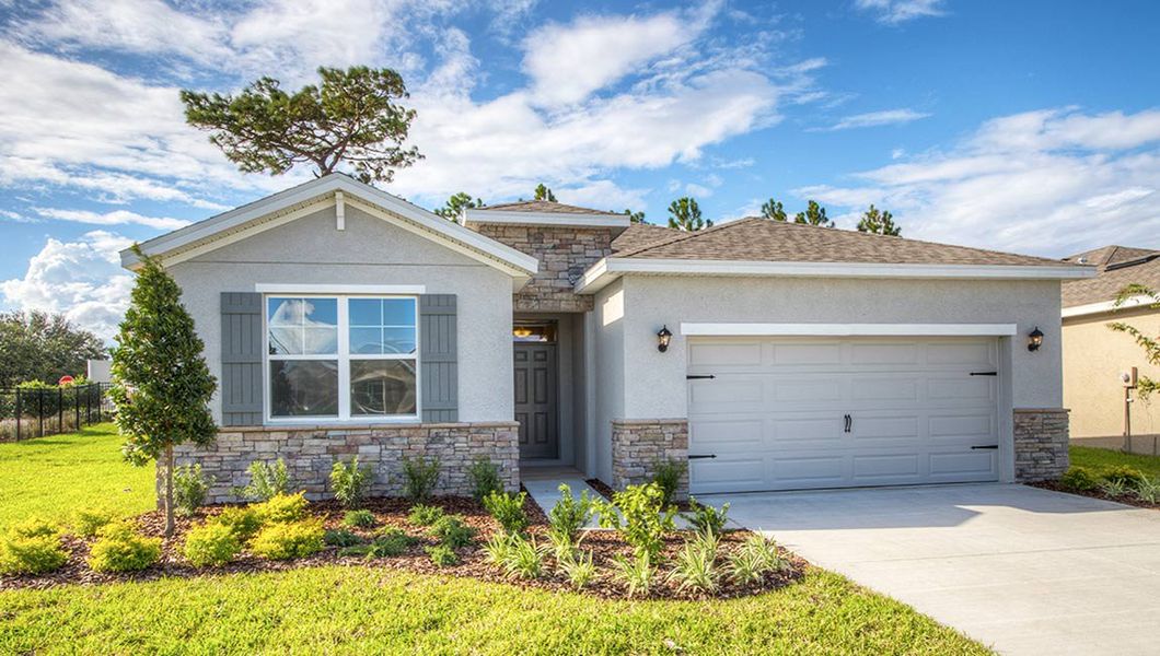 Front exterior of a home in the Mockingbird Reserve at Winding Oaks community, located in Ocala, FL (Image 3).