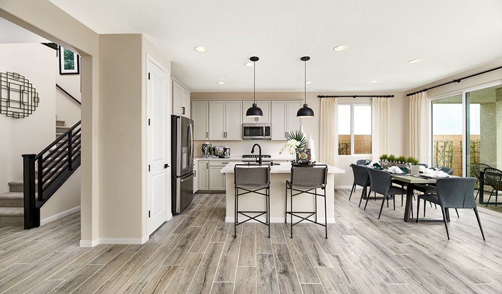 Furnished interior in a model home at Meridian at Star Valley in Tucson (Image 13).