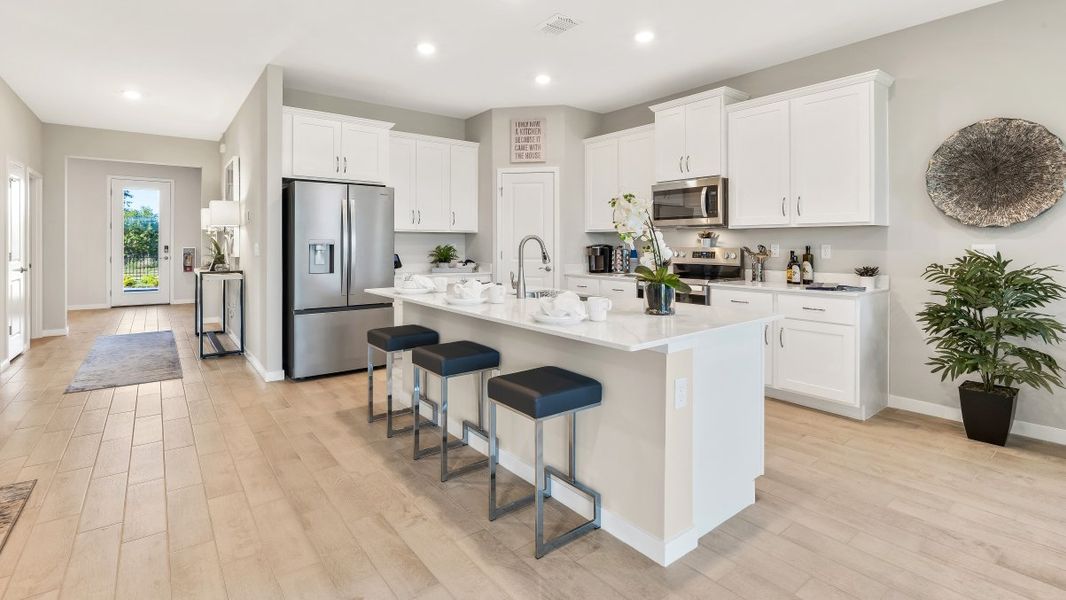 Furnished interior in a model home at Coral Lakes - Tradition & Express in Punta Gorda (Image 18).