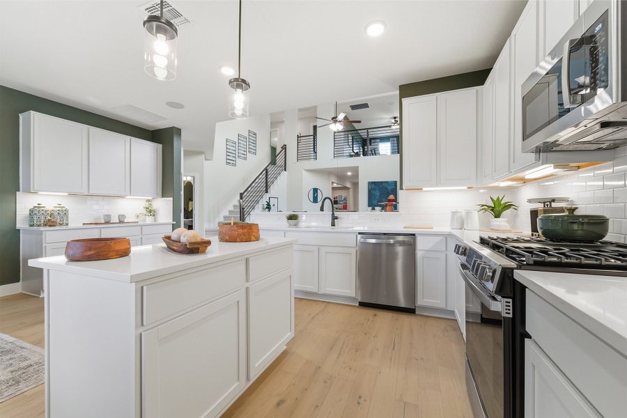 Furnished interior in a model home at Infinity Square in Kyle (Image 20).