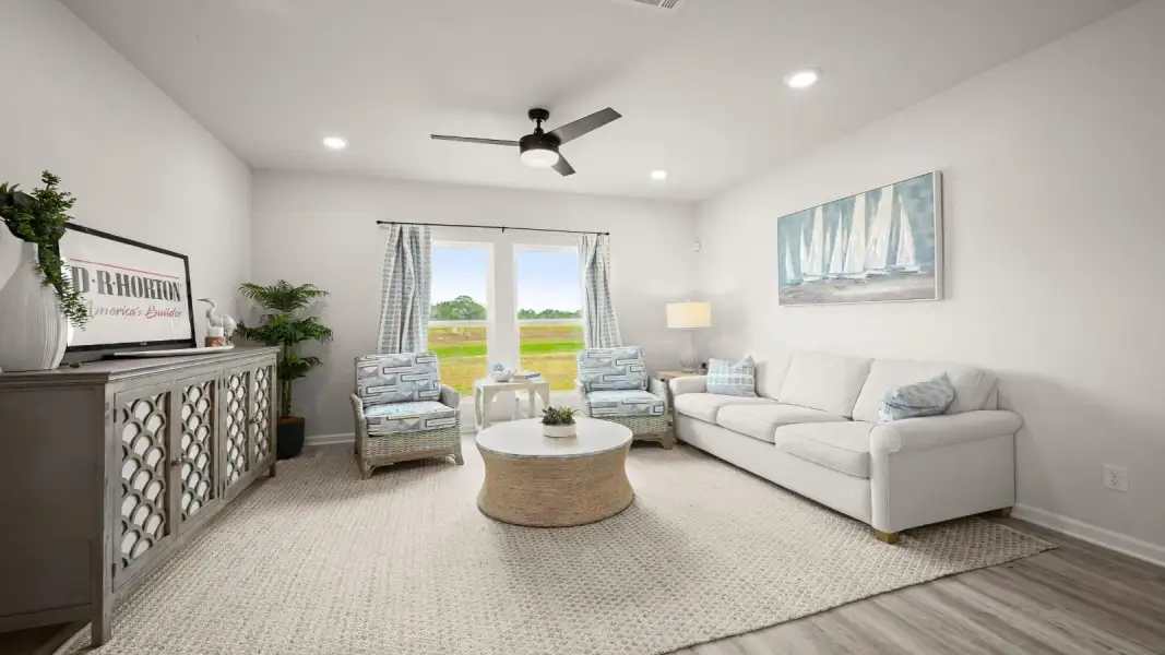 Furnished interior in a model home at Brookwater in Texas City (Image 5).