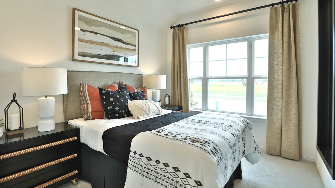 Luxurious bedroom features refined materials, expansive window, and exquisite decor in Bridgeland. Luxurious bedroom features refined materials, expansive window, and exquisite decor in Bridgeland.
