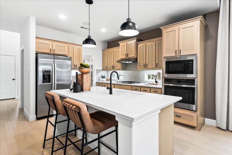 Furnished interior in a model home at The Reserve at Spiritas Ranch in Little Elm (Image 22).