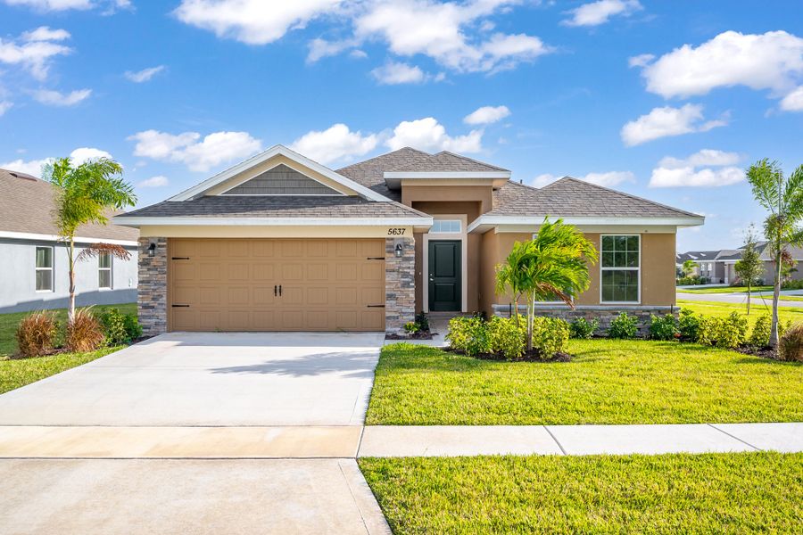 Front exterior of a home in the Waterstone Villas community, located in Fort Pierce, FL (Image 14).