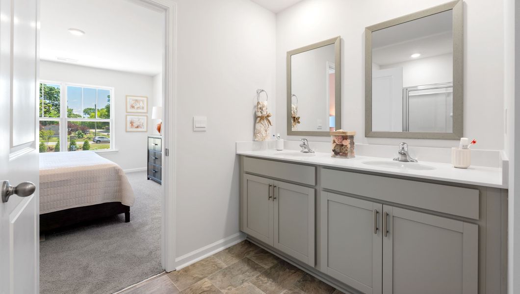 Furnished interior in a model home at Tanglewood Townes in Greenville (Image 22).