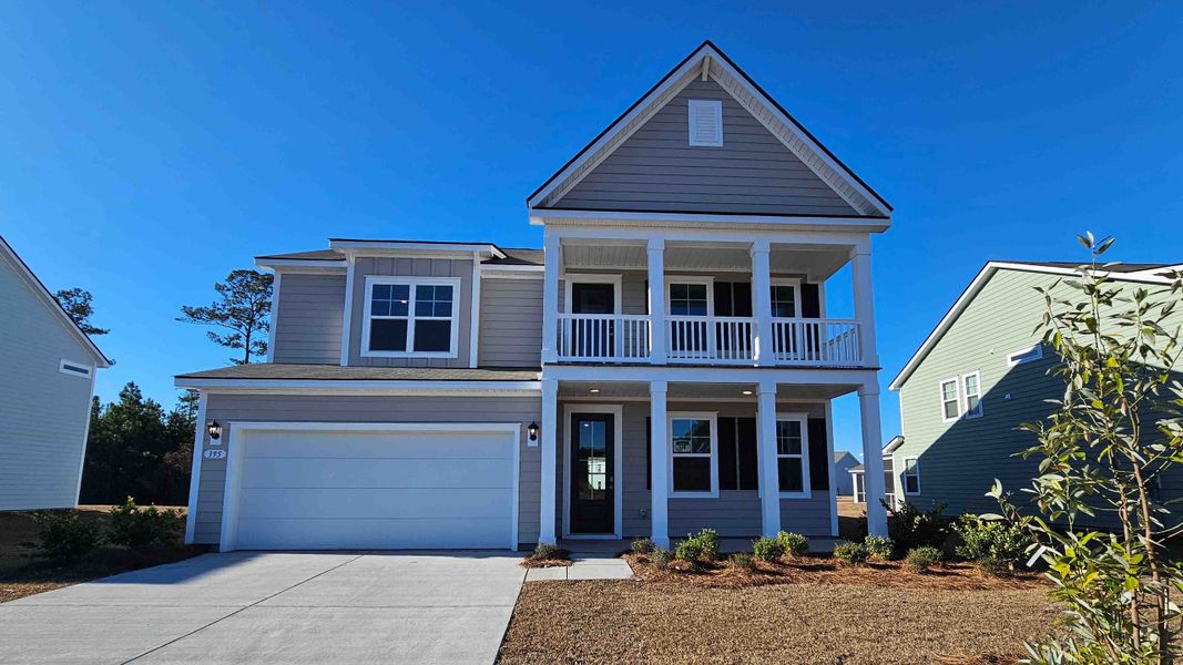 Front exterior of a home in the Belle Park community, located in North Myrtle Beach, SC (Image 2). Front exterior of a home in the Belle Park community, located in North Myrtle Beach, SC (Image 2).