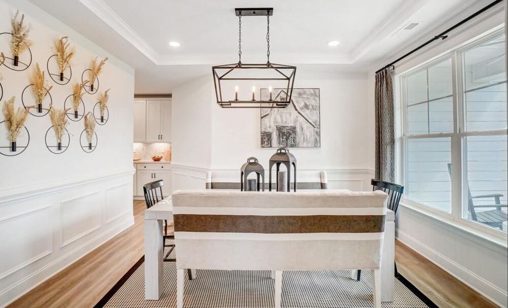 Furnished interior in a model home at Peyton's Creek in Statesville (Image 4).