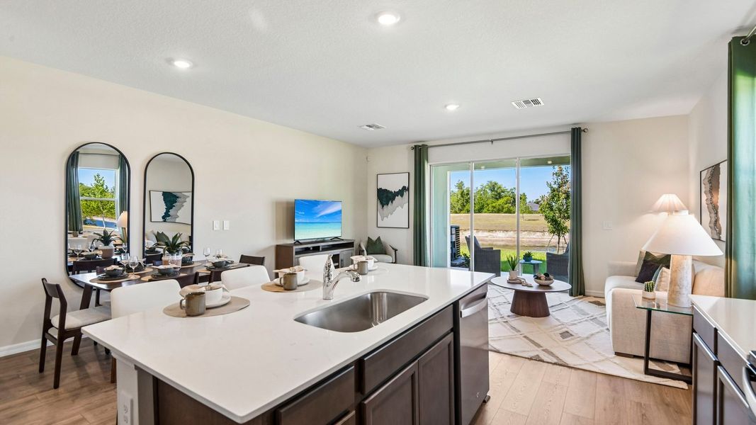 Furnished interior in a model home at Sanctuary at Citrus Park Townhomes in Tampa (Image 10).