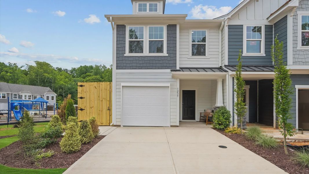 Front exterior of a home in the North First Street Townes community, located in Mebane, NC (Image 1).