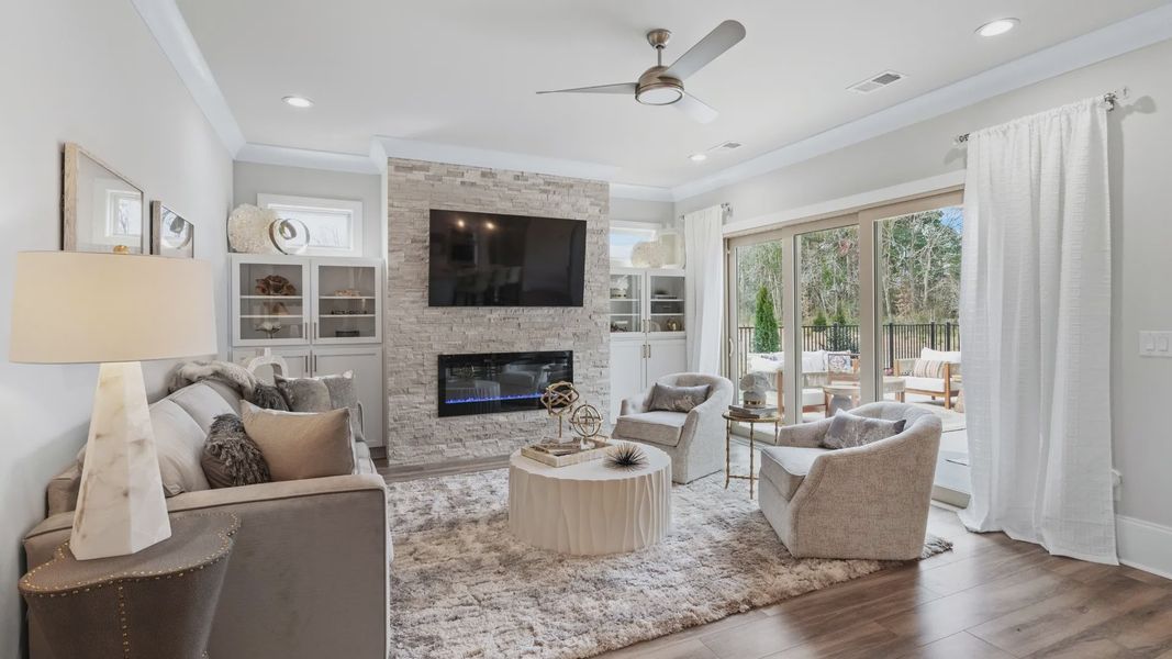 Furnished interior in a model home at Courtyards by Carrell in Ocean Isle Beach (Image 7).