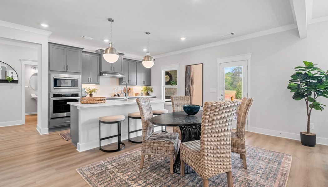 Furnished interior in a model home at Summerlin in Winder (Image 26).