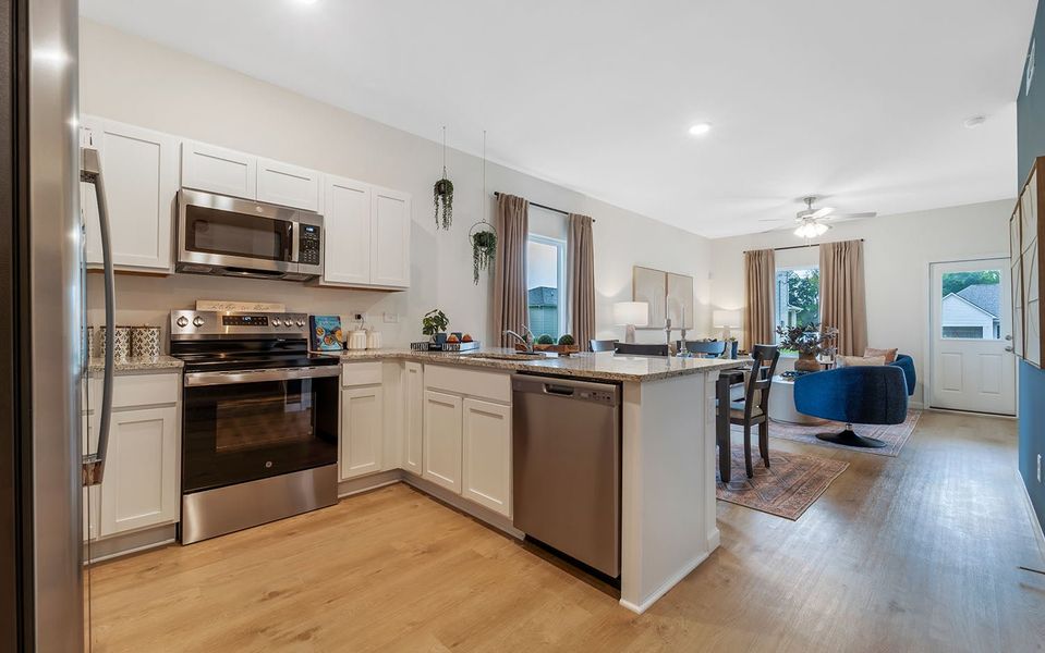 Furnished interior in a model home at Stonehenge in Manchester (Image 4).