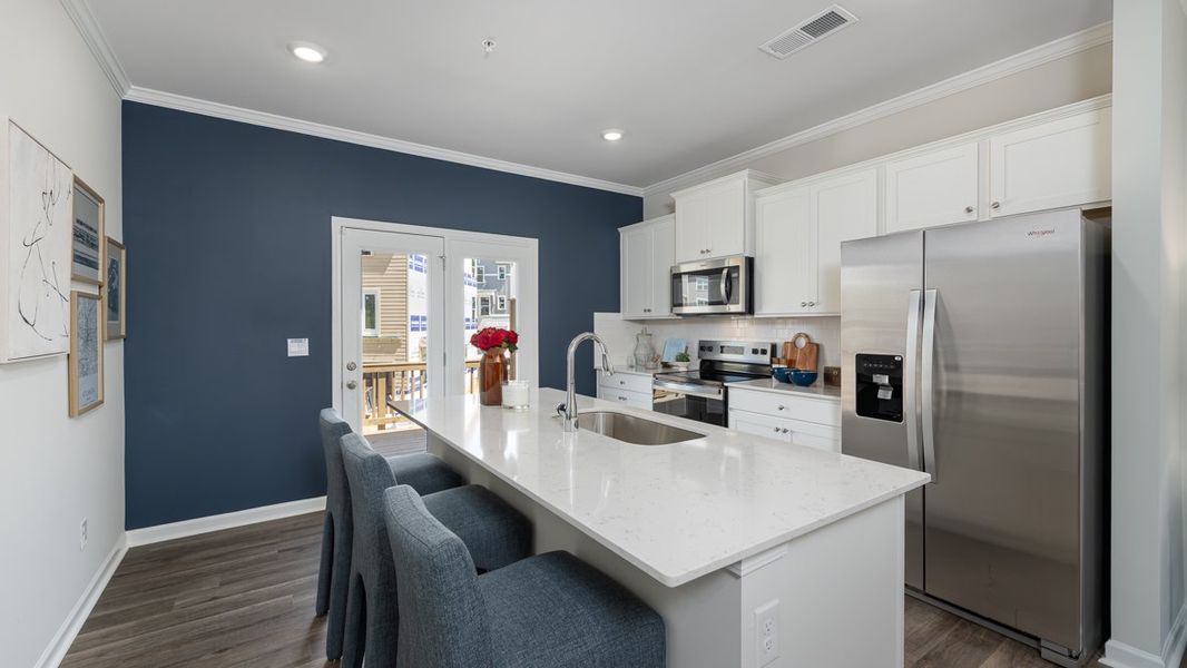 Furnished interior in a model home at Townes at Asbury in Atlanta (Image 25).