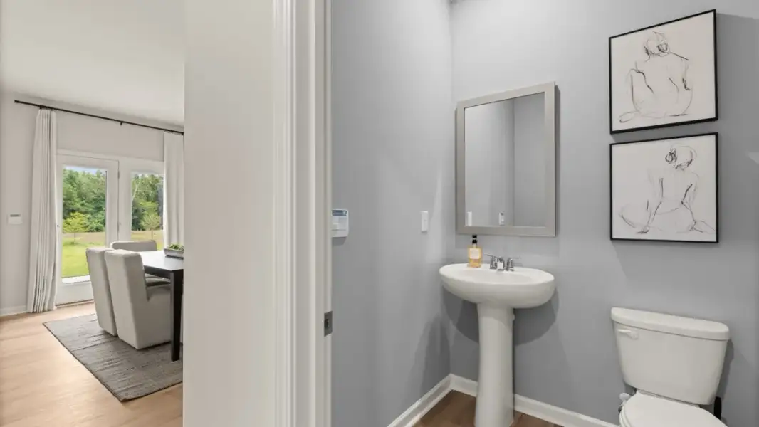 Furnished interior in a model home at Enclave at Stonewall Tell in South Fulton (Image 10).