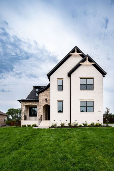 Front exterior of a home in the The Reserve at Wright Farms community, located in Mount Juliet, TN (Image 3).
