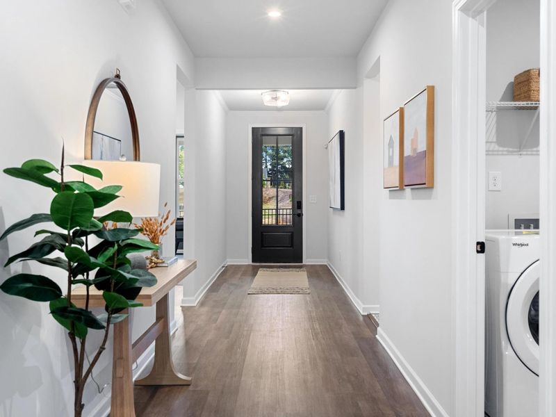 Furnished interior in a model home at Kelly Preserve in Loganville (Image 8).