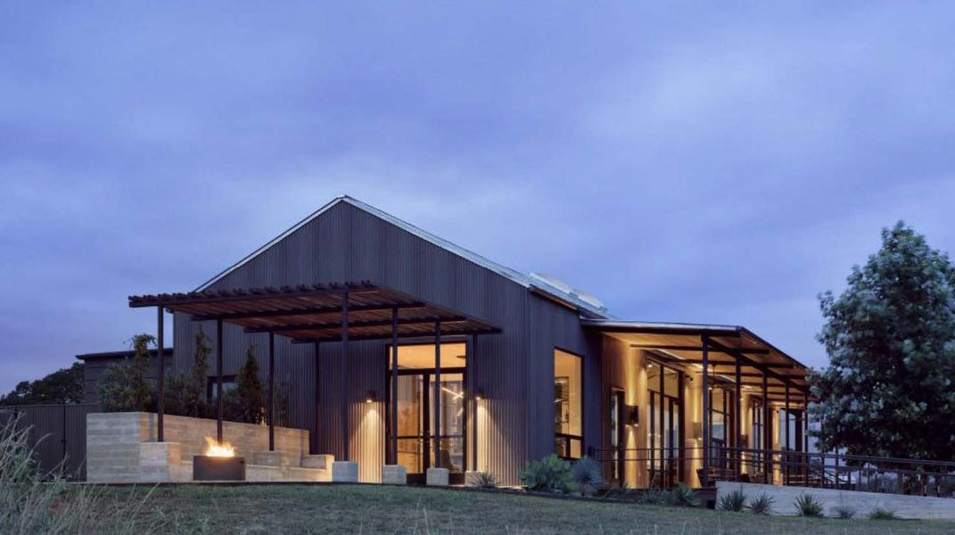 A house with a glass front. A house with a glass front.