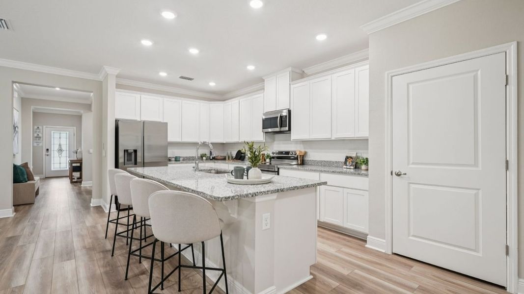 Furnished interior in a model home at Oakwood Estates in Green Cove Springs (Image 8).