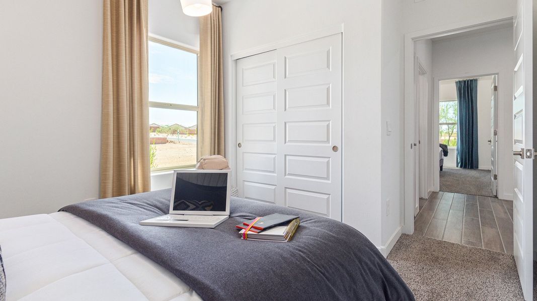 Furnished interior in a model home at Redford Estates in Tucson (Image 25).