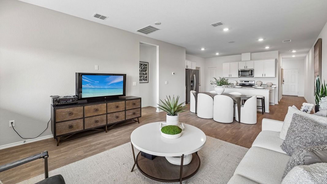 Furnished interior in a model home at Palomino in Manor (Image 6).