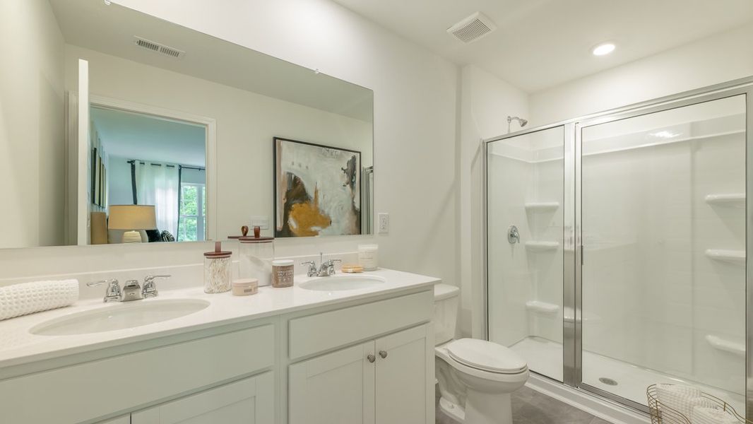 Furnished interior in a model home at Wellington Park in Lithonia (Image 19).