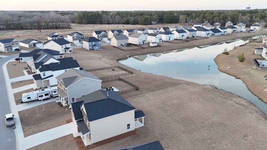 Aerial view of the The Grove community in Florence, SC, showing layout and nearby surroundings (Image 1). Aerial view of the The Grove community in Florence, SC, showing layout and nearby surroundings (Image 1).