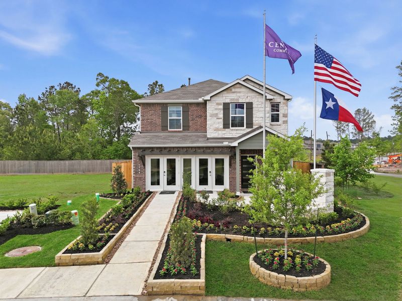 A house with flags in the front.
