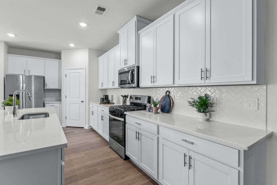 Furnished interior in a model home at Crown Pointe in Georgetown (Image 6).
