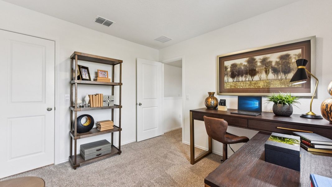 Furnished interior in a model home at Palomino in Manor (Image 40).