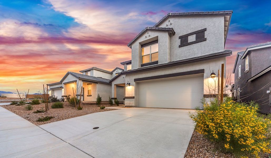Front exterior of a home in the The Oasis at Rocking K community, located in Vail, AZ (Image 4).