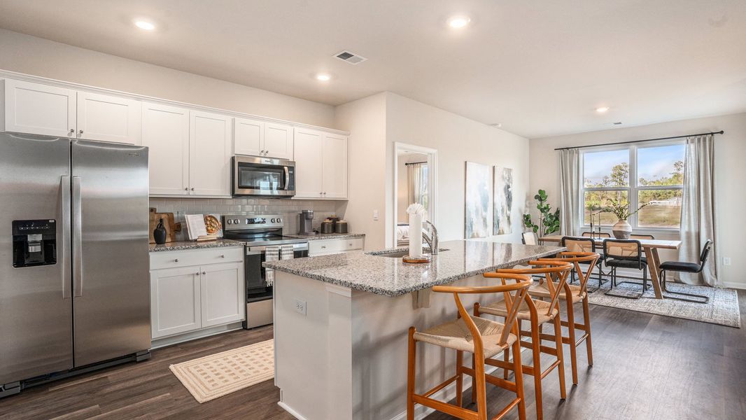 Furnished interior in a model home at Pinewood Estates in Conway (Image 5).