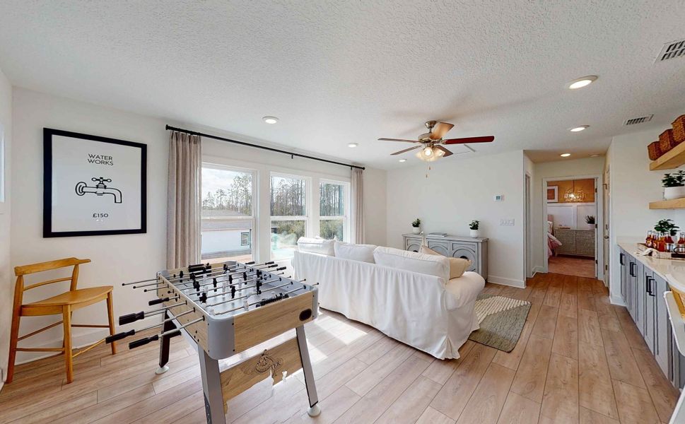 Captiva floor plan model game/flex room by Century Communities