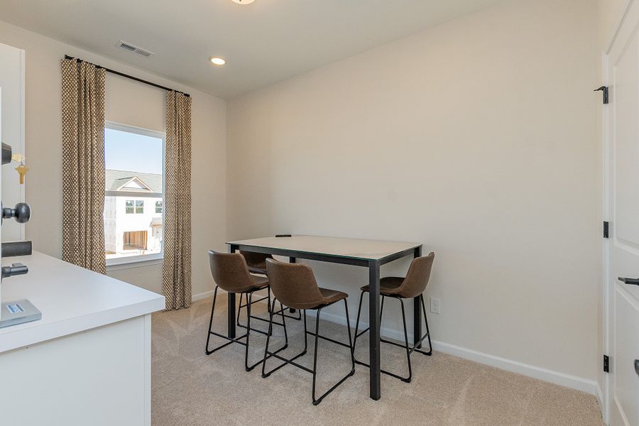 Furnished interior in a model home at Dawson Landing in Charlotte (Image 31).
