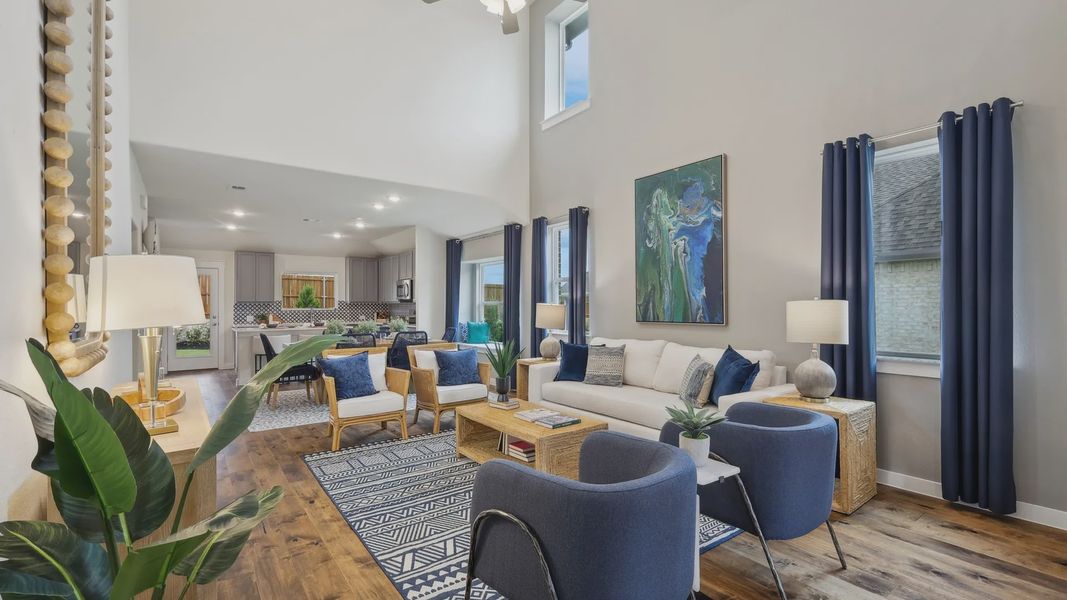 Experience elevated design with soaring ceilings and elegant wood flooring in Churchill's stylish living area. Experience elevated design with soaring ceilings and elegant wood flooring in Churchill's stylish living area.