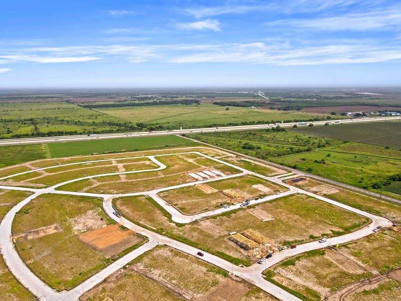 Aerial view of the Brookewater community in Rosenberg, TX, showing layout and nearby surroundings (Image 11).
