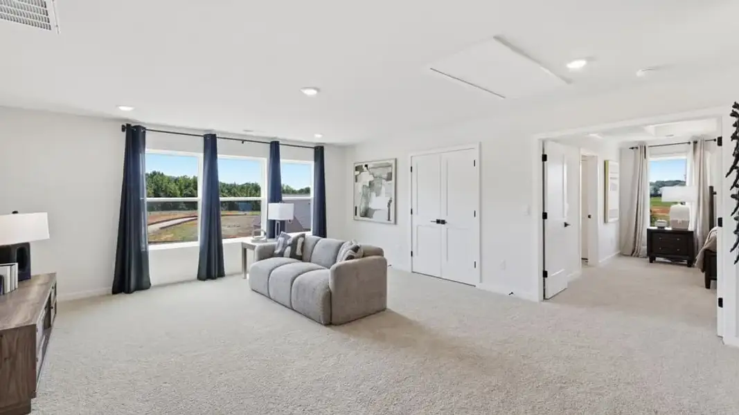 Furnished interior in a model home at Spring Ridge Reserve in Anderson (Image 27).