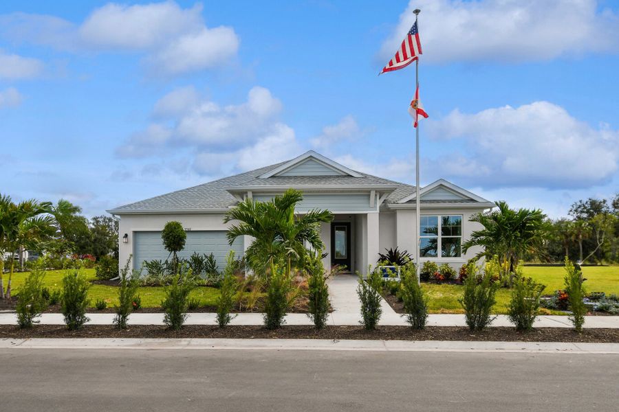 Front exterior of a home in the Coasterra community, located in Palmetto, FL (Image 3).