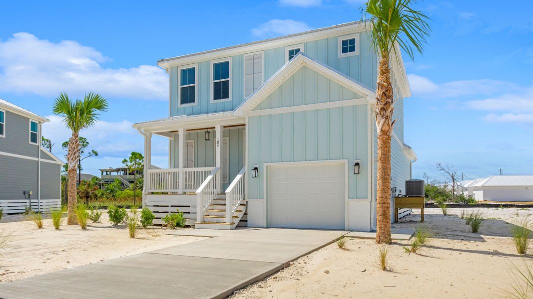 Front exterior of a home in the Redfish Cove at Cape San Blas community, located in Port Saint Joe, FL (Image 14).