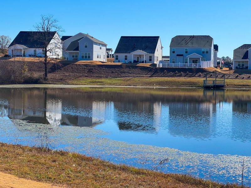 Front exterior of a home in the Crown Pointe community, located in Simpsonville, SC (Image 1).