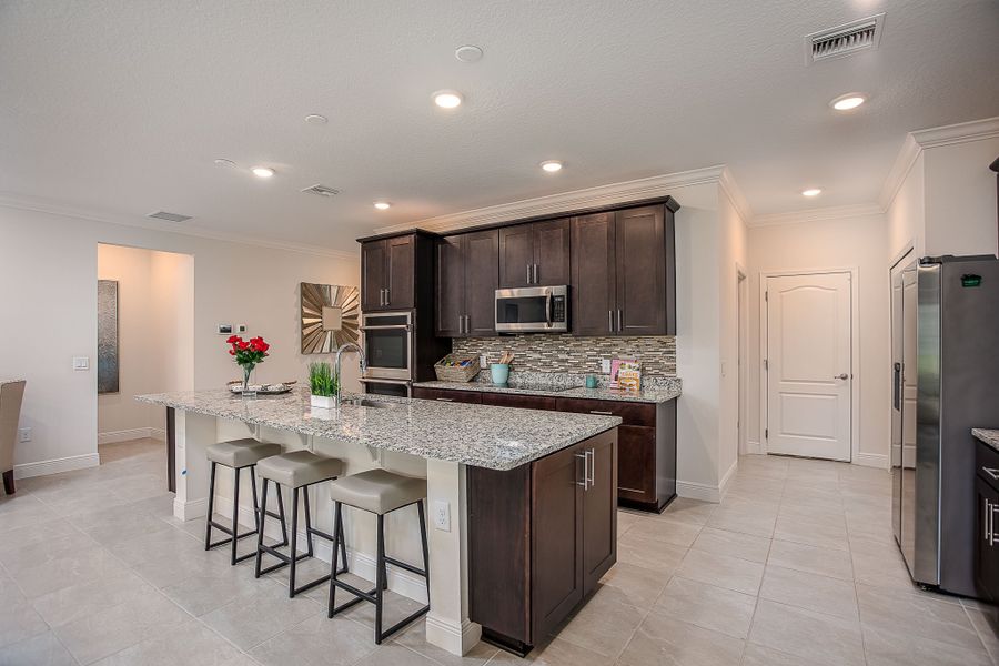 Furnished interior in a model home at Pine Ridge in Beverly Hills (Image 3).