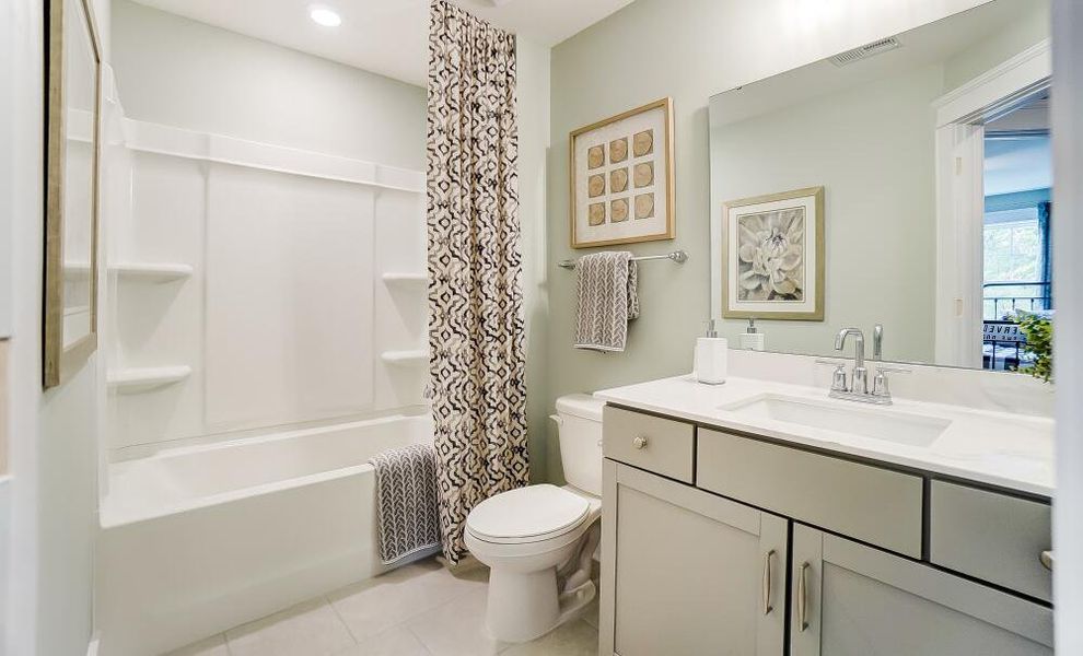 Furnished interior in a model home at CraigStone in Woodruff (Image 25).